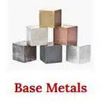 Photo of six cubes of base metals stacked on top of each other with the words "Base metals" written in red