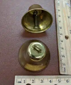 Image of a gold-colored bell-shaped jewelry finding, often used as a decorative element or end cap in jewelry making.