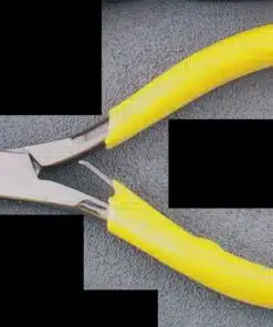 Photo of a pair of yellow pliers laying on a table